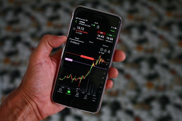 a mobile phone with a picture of a stock chart