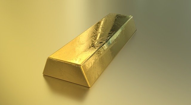 a picture of a gold bar, gold mining stocks